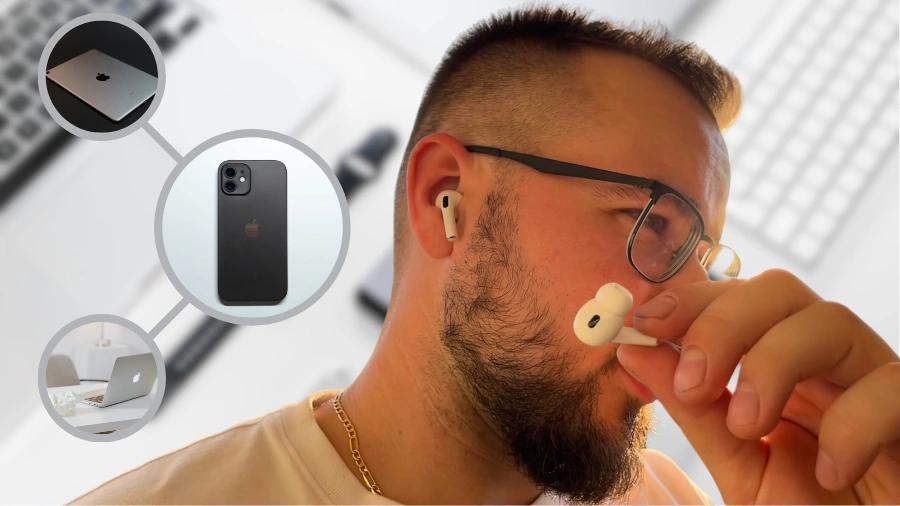 AirPods Pro 2 im Ohr und sowohl in der Hand haltend in die Kamera