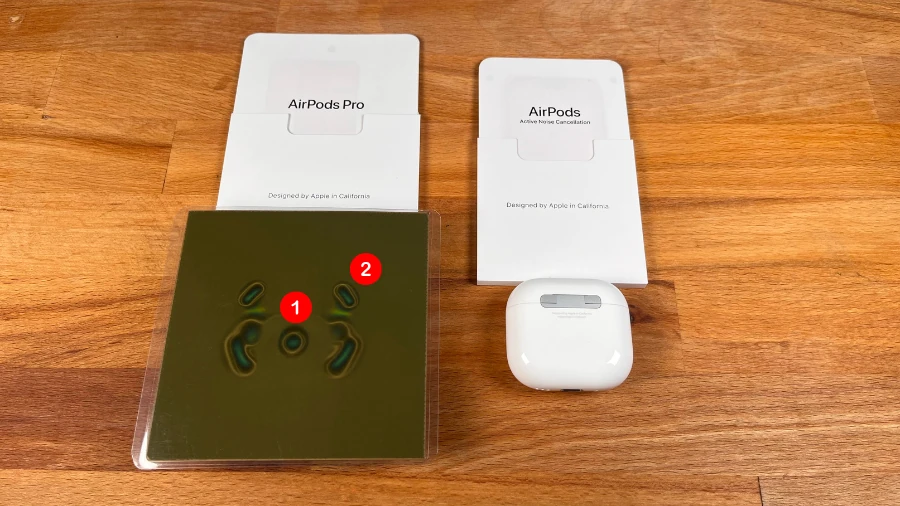 Magnete der AirPods Pro 2 durch eine magnetische Folie sichtbar gemacht.